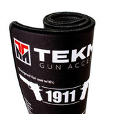 Close-up of Tekmat surface protecting firearm during maintenance